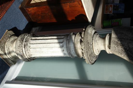 A carved marble bust of a Greek warrior, height of bust 3ft, height overall 6ft 8in.